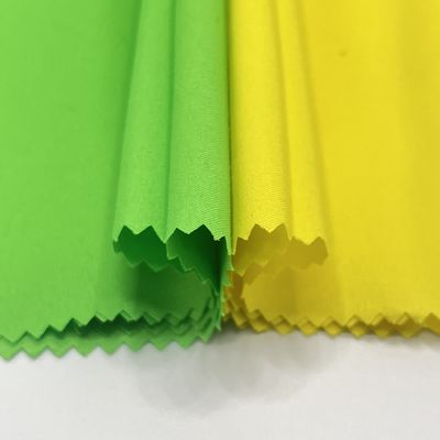 Pantalhões de praia de veludo impermeáveis de pele de pêssego Tecido para roupas de praia de luxo de alto desempenho